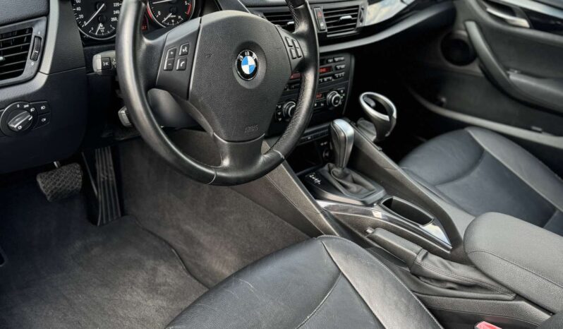 
								2011 BMW X1 pilnas									