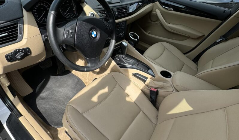 
								2011 BMW X1 pilnas									